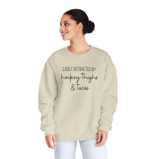 Easily Distracted by: Hockey Thighs and Tacos Unisex Jerzees Crewneck Sweatshirt