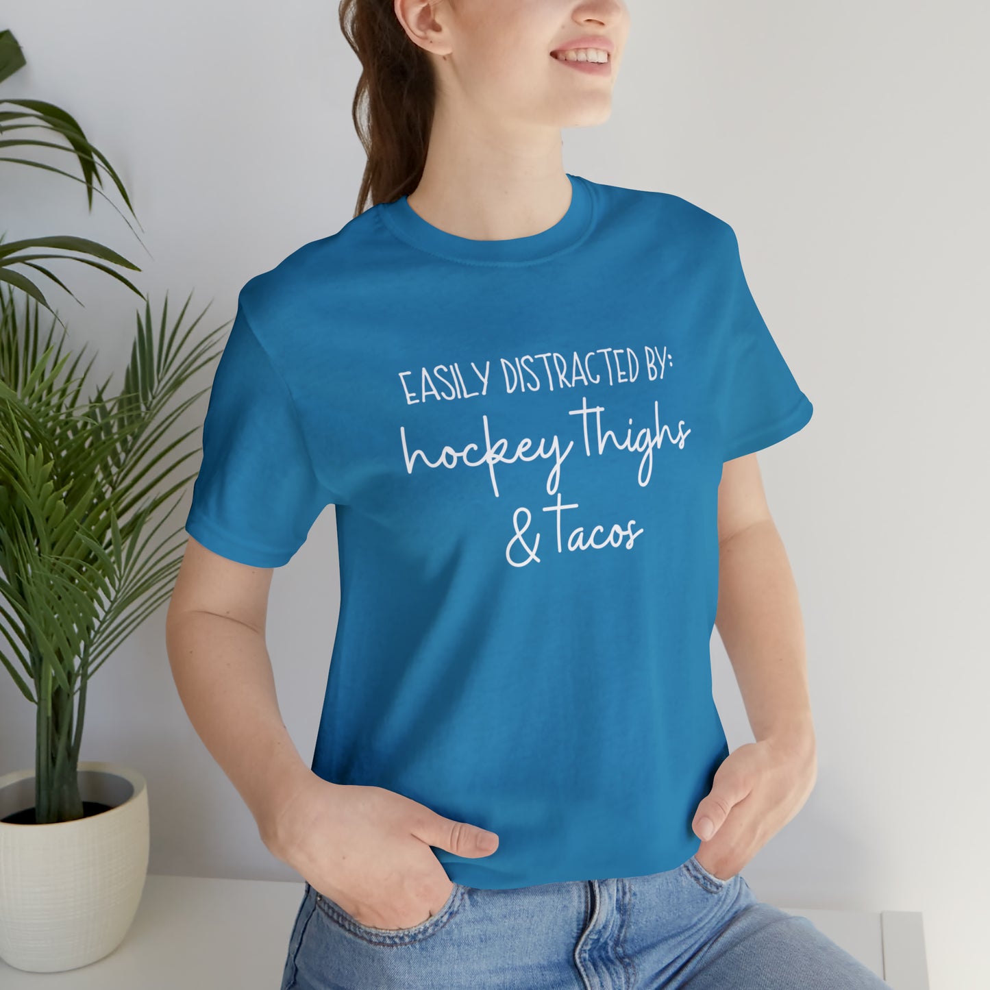 Easily Distracted by: Hockey Thighs and Tacos Unisex Bella + Canvas Tee